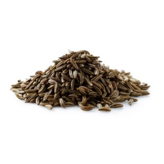 A pile of dry caraway or cumin seeds isolated on white.